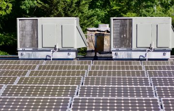 Rooftop solar panels connected to HVAC systems
